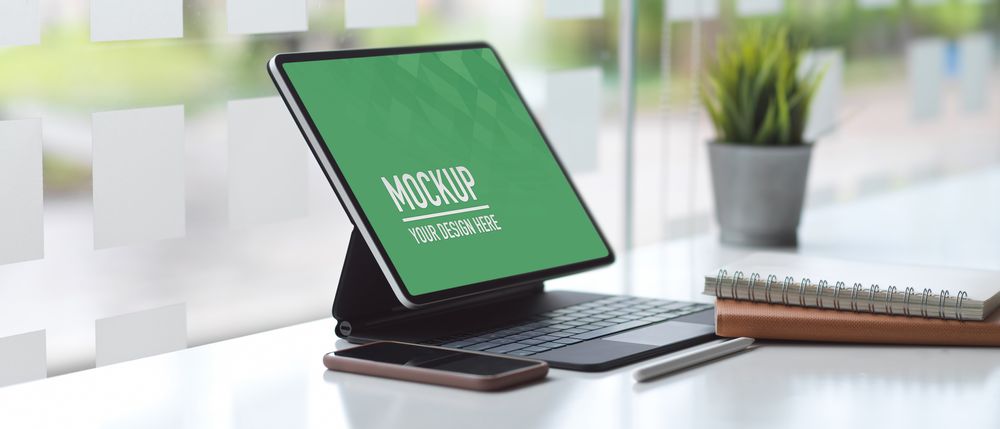 Worktable with clipping path tablet, keyboard, smartphone and notebooks
